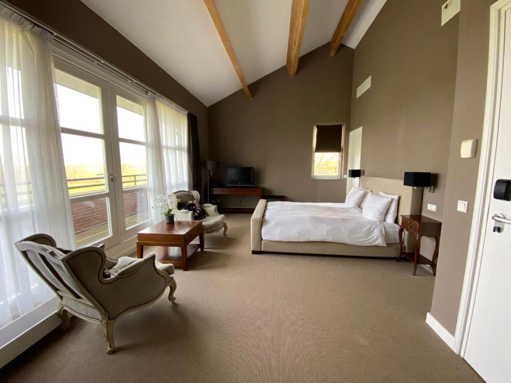 Landhotel De Ijsvogel Sint Nicolaasga Extérieur photo