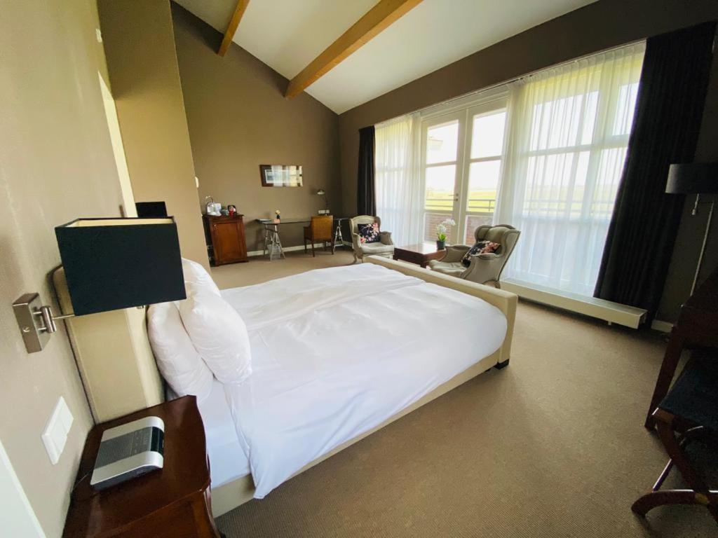 Landhotel De Ijsvogel Sint Nicolaasga Extérieur photo
