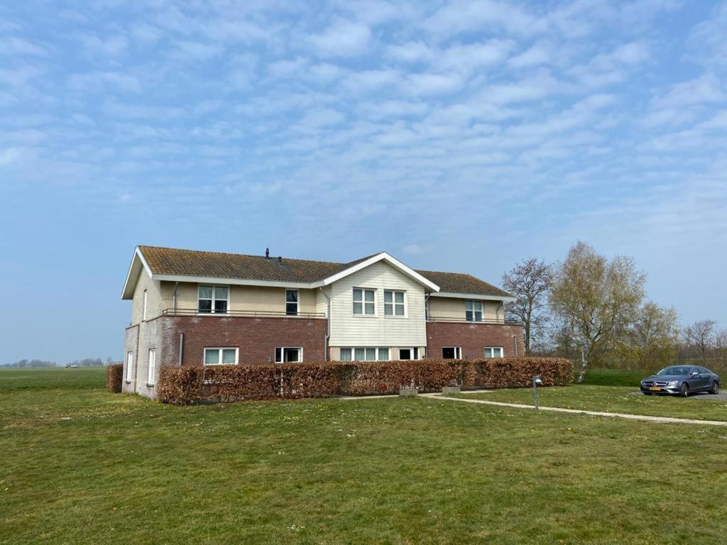 Landhotel De Ijsvogel Sint Nicolaasga Extérieur photo